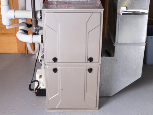 Double stage gas furnace in the basement of a La Plata home